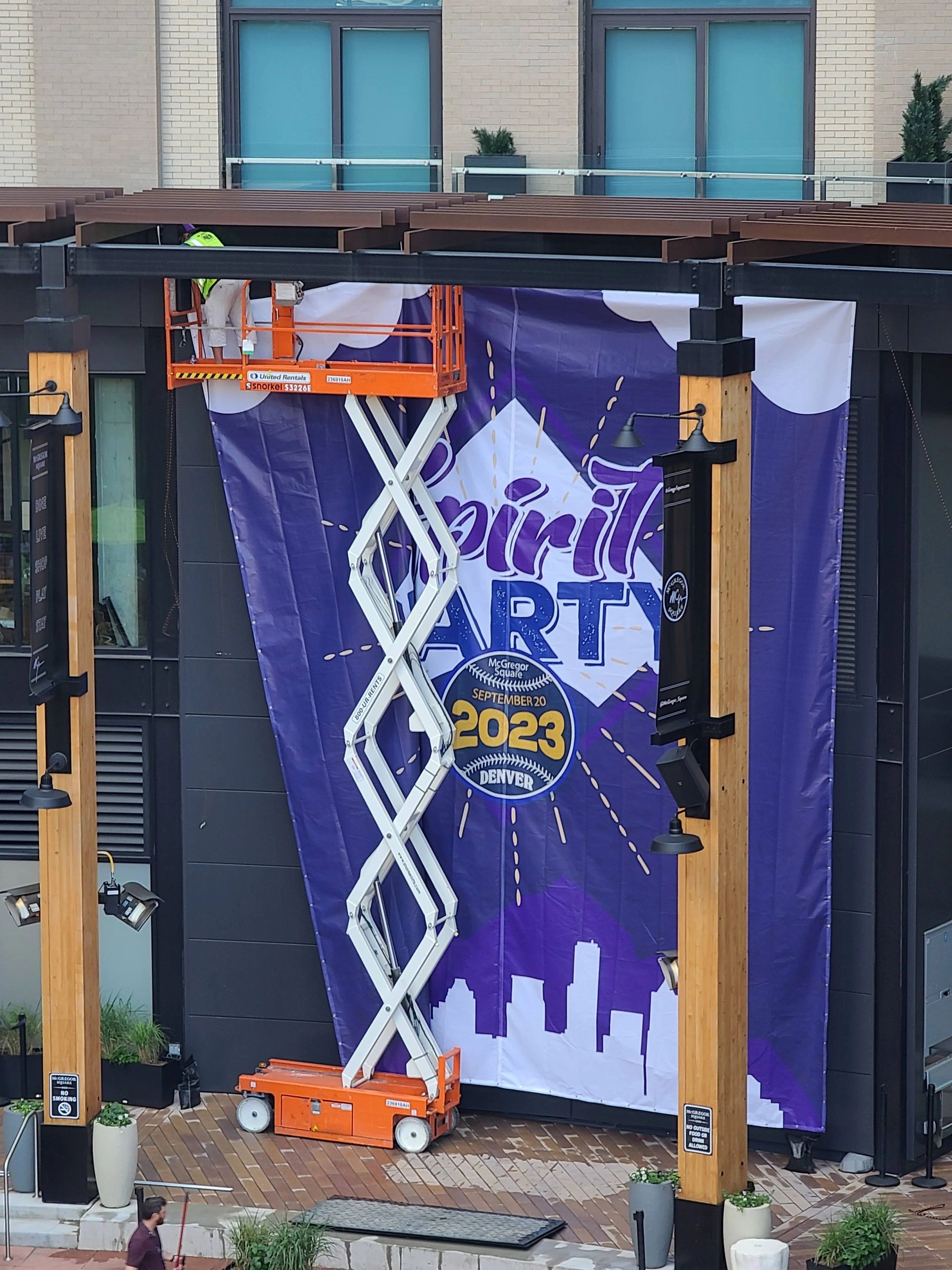 Banner installation on a building exterior